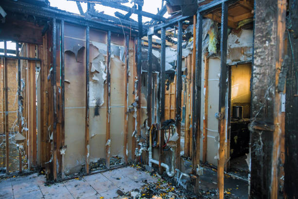 Professional Fire Damage Restoration technician working in Clear Lake, IA
